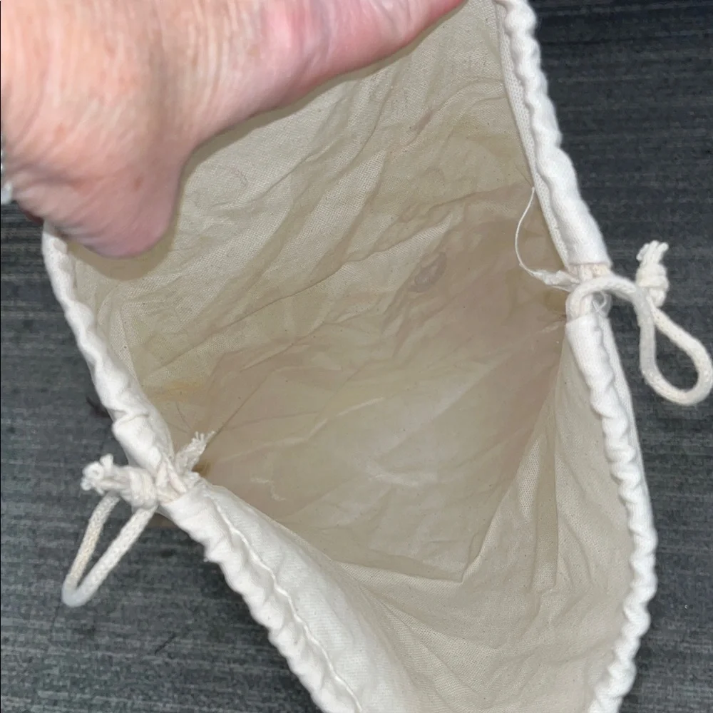 The House of Noa Cream Drawstring Dust Bag with darling print